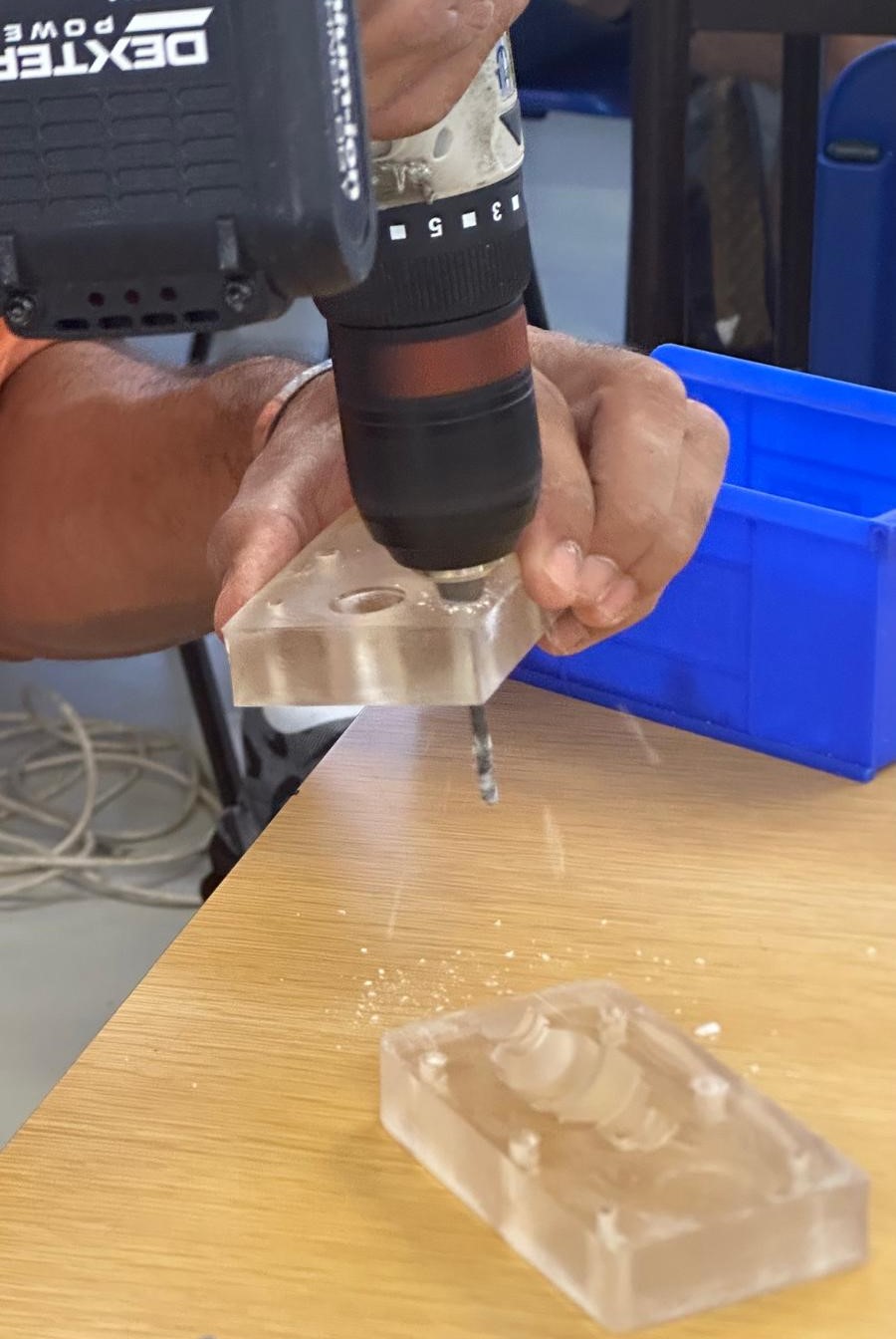 Drilling the mold for screws